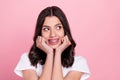 Photo of adorable happy young woman look empty space wear teeth braces  on pink color background Royalty Free Stock Photo