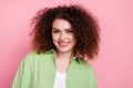 Photo of adorable positive cheerful woman with perming coiffure dressed stylish shirt toothy smiling isolated on pink