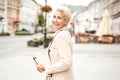 Adult stylish woman looking at camera