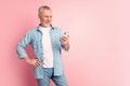 Photo of aged man look cellphone post repost coment social network isolated over pink color background