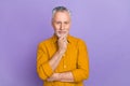 Photo of agent elder white hairdo man hands face wear yellow shirt isolated on purple color background Royalty Free Stock Photo