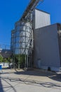 Agricultural Industrial Background. Huge metal grain silos