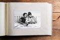 Photo album with picture of young family. Fathers day. Royalty Free Stock Photo