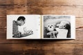 Photo album with pictures of father and baby son. Fathers day. Royalty Free Stock Photo