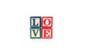 Photo of a alphabet blocks spelling LOVE isolate on white background Royalty Free Stock Photo