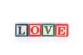 Photo of a alphabet blocks spelling LOVE isolate on white background Royalty Free Stock Photo