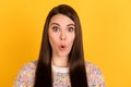 Photo of amazed astonished young woman news information sale shock isolated on shine yellow color background