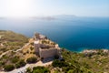 Photo of ancient fortress, sea, blue clear sky, mountain fortress. Royalty Free Stock Photo