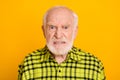 Photo of angry old man pensioner unhappy mad crazy conflict disagreement isolated over yellow color background Royalty Free Stock Photo