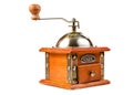 Photo of an antique coffee grinder on white