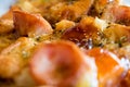 Photo, appetizing pizza with sausage, cheese, tomatoes and mayonnaise close-up,selective focus.