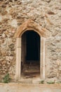 Photo of arch entrance, ancient castle interior. Old Arch made of stone