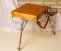 Photo of Artist tool box. Painter`s case with portable easel. Th Royalty Free Stock Photo