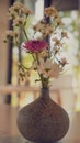 artistic flowers vase in the room Royalty Free Stock Photo