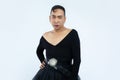 Photo Of Asian Gay In Black Dress Posing On White Wall Background. Lgbtq And Lgbtq  Pride Month, People Emotion Concept