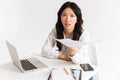 Photo of asian woman employee with long dark hair working in off Royalty Free Stock Photo