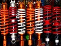 Assorted colorful motorcycle shock absorbers Royalty Free Stock Photo