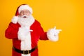 Photo astonished beard santa claus impressed x-mas noel christmas adverts discount point finger copyspace wear cap