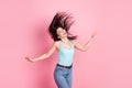 Photo of astonished beauty millennial lady hair up wear blue top isolated on pink color background Royalty Free Stock Photo
