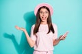 Photo of astonished millennial girl hold smartphone scream wear sunhat isolated over teal color background