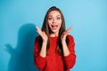 Photo of astonished positive girl impressed scream wear pullover isolated over blue color background