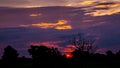 A photo of the atmosphere, the sunset in the evening, where the light hits various objects, creating various shades of color,