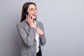 Photo of attractive business lady confident manager worker hold telephone hands talk partner laughing good jokes wear Royalty Free Stock Photo