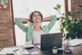 Photo of attractive business lady notebook table hands behind head good mood look up dreamer distance home remote work Royalty Free Stock Photo