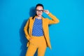 Photo of attractive business lady successful worker hold hand touch spectacles good eyesight wear yellow blazer suit Royalty Free Stock Photo