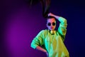 Photo of attractive charming stunning lady hold hand hair tail fly wind isolated on gradient neon background