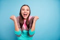 Photo of attractive feeling perfect nice glad teen girl celebrating her victory and triumph isolated vivid background