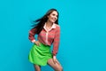 Photo of attractive hispanic appearance lady posing camera shooting wearing blouse mini skirt  teal blue color Royalty Free Stock Photo