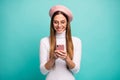 Photo of attractive lady hold telephone hands reading new post instagram likes wear specs modern pink beret cap white