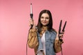 Photo of attractive lady holds curling hair smile happy, wears casual jeans jacket white undershirt isolated pink color