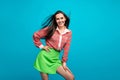 Photo of attractive latin lady posing photographer camera shooting wearing blouse mini skirt isolated teal blue color Royalty Free Stock Photo