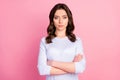 Photo of attractive pretty lady not smiling self-confident business woman arms crossed bossy look wear casual white Royalty Free Stock Photo