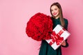 Photo of attractive pretty wonderful charming nice glad with tothy smile lady holding huge bouquet in hands and large Royalty Free Stock Photo
