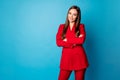 Photo of attractive self-confident business lady hold arms crossed toothy smiling bossy person wear red luxury office