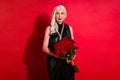 Photo of attractive senior grey haired lady luxury look rich person movie star hold big bunch roses fans present red Royalty Free Stock Photo