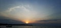 Photo background view of the evening sun over the sea Royalty Free Stock Photo