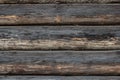 Photo background of a wooden wall of a log house Royalty Free Stock Photo