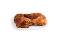 Photo baked chicken leg on a plate