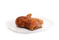 Photo baked chicken leg on a plate