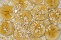 Banana slices with oats and honey close up