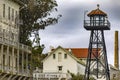 Photo of barracks and watchtower of the federal prison on Alcatraz Island of the United States of America in the bay.