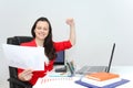 Beautiful business woman dreaming while working on computer at her office Royalty Free Stock Photo