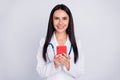 Photo of beautiful cheerful doc lady hold telephone read online prescription network website innovation wear stethoscope