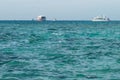 Photo of beautiful clear turquoise sea ocean water surface with ripples low waves on seascape background and ships or Royalty Free Stock Photo