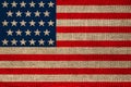 Photo of the beautiful colored national flag of the modern state of USA on textured fabric, concept of tourism, emigration, Royalty Free Stock Photo