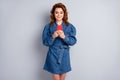 Photo of beautiful funny foxy lady good mood hold telephone hands chatting friends cheerful wear casual blue denim short